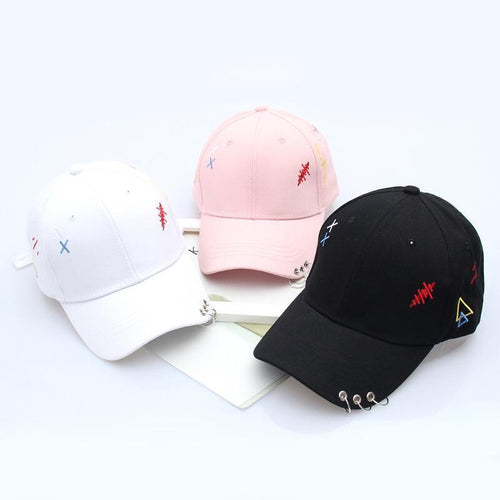"GEOMETRIC PIERCED" CAPS